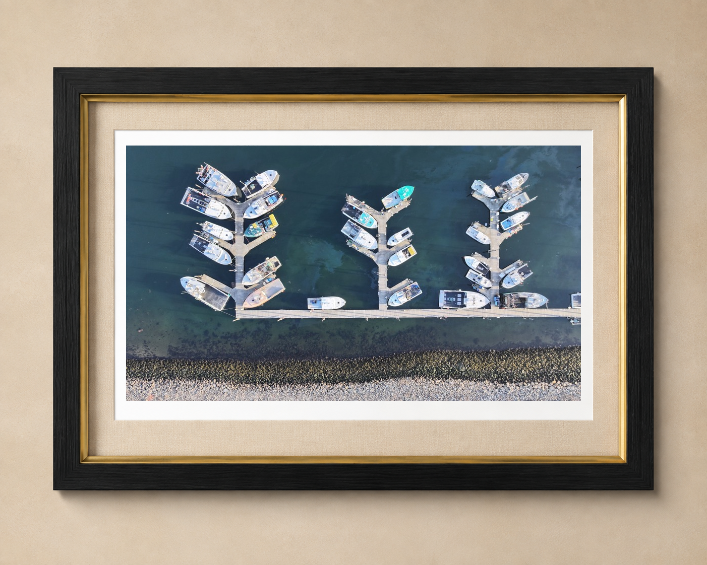 Mooring Field fine-art photograph shown with its full paper margin in a bespoke ebonized maple, aged gold, and oatmeal linen frame